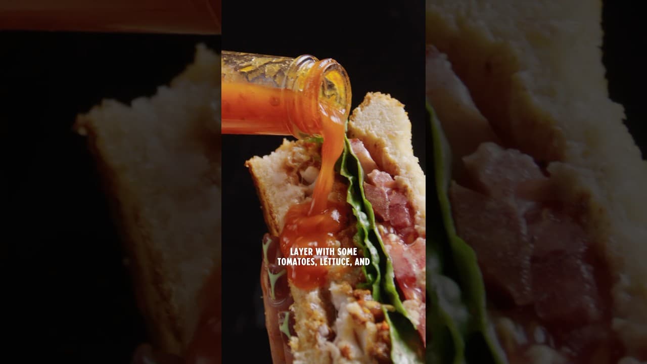 Fried catfish sandwich with hot sauce